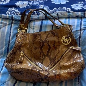 Michael Kors snakeskin purse with gold hardware